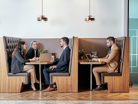 Servcorp Abu Ouf Plaza in Madinah features elegant booth seating, providing clients with a quiet, professional space for meetings and individual work.